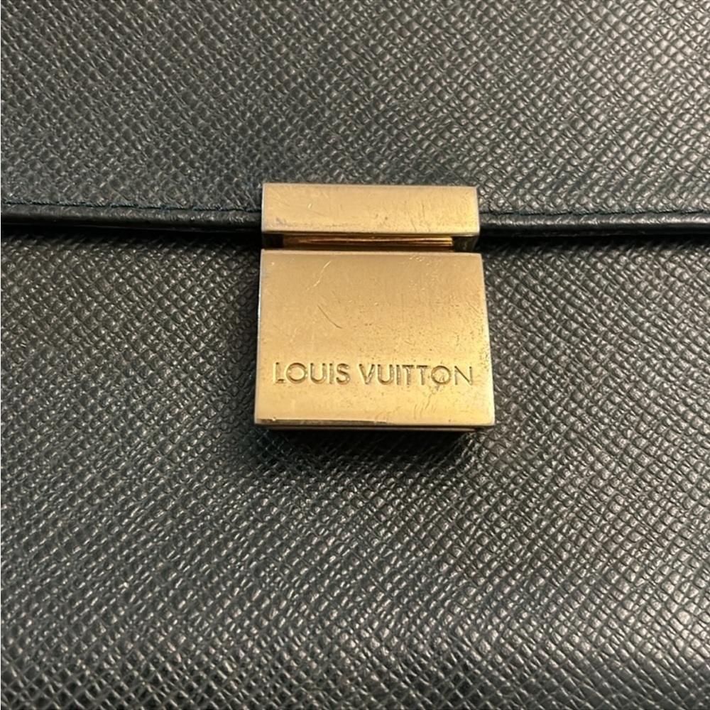 LOUIS VUITTON Louis Vuitton Green Taiga Leather Clutch